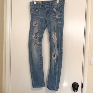 Women’s ripped jeans .